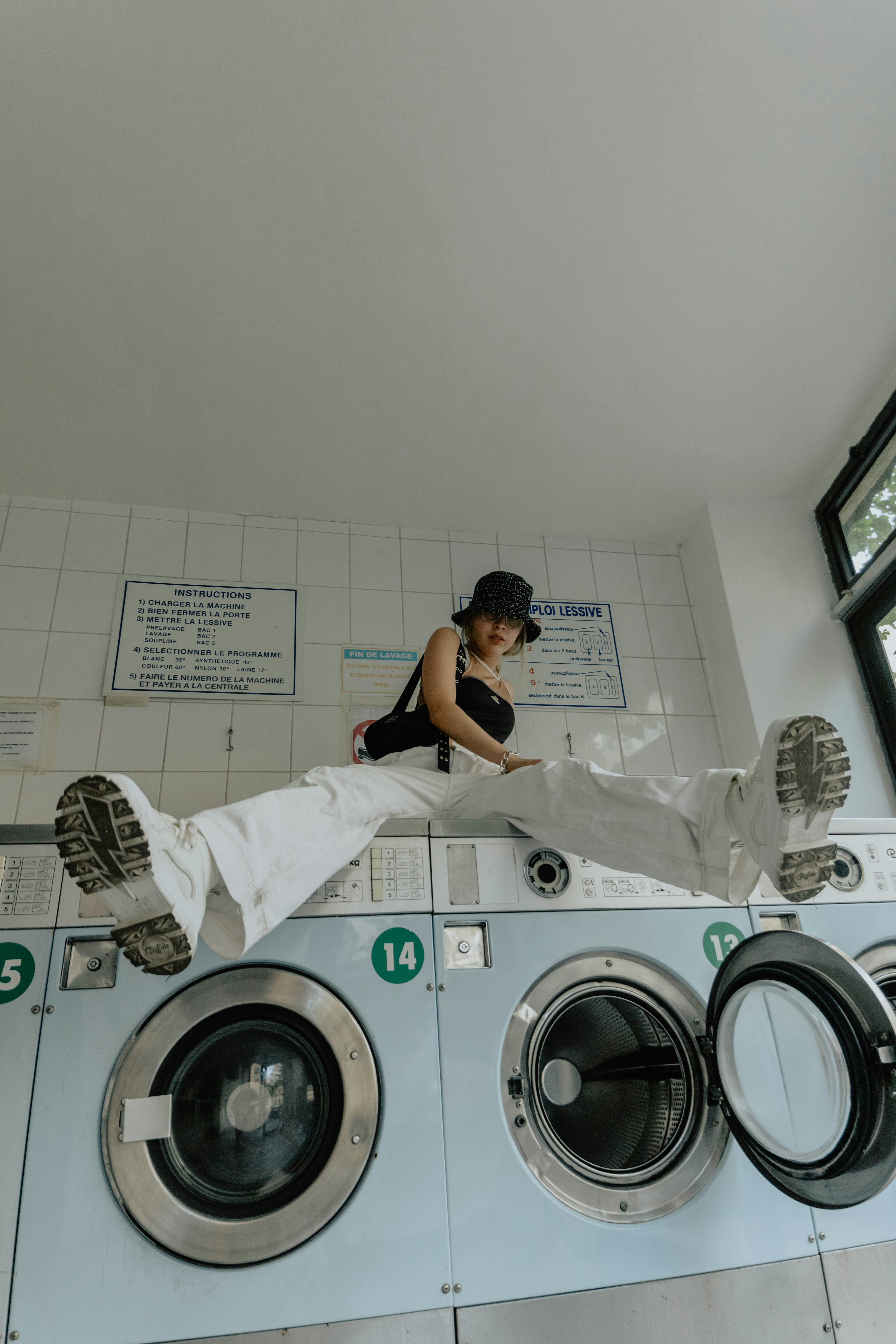 Girl Sitting On Washing Machine